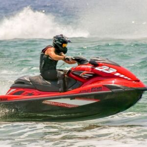 man-riding-red-speedboat